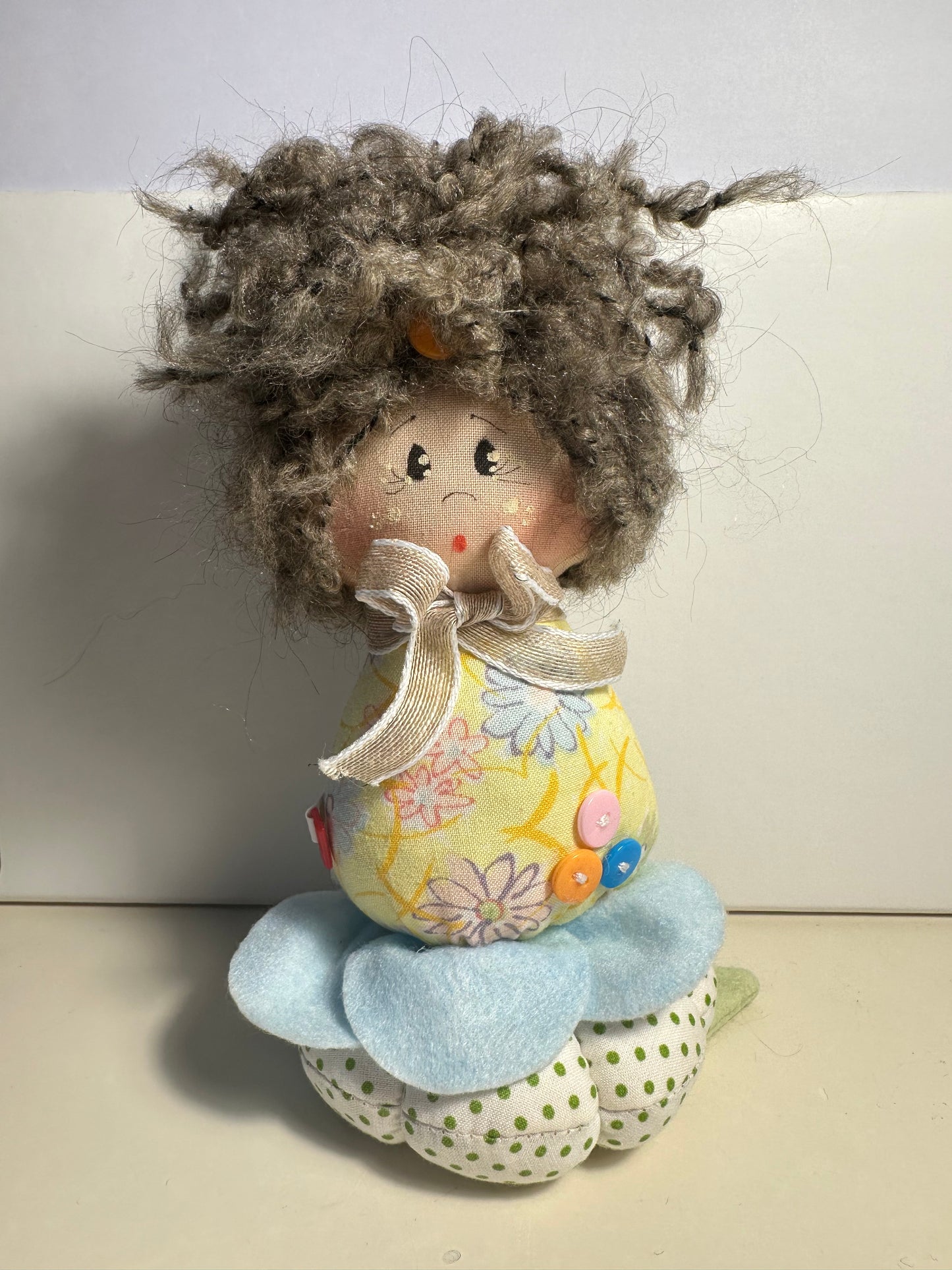 Doll with tape measure and pincushion