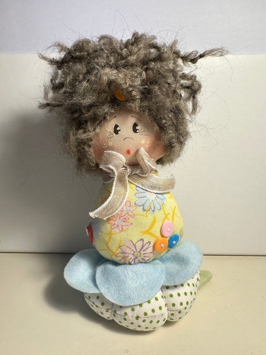 Doll with tape measure and pincushion