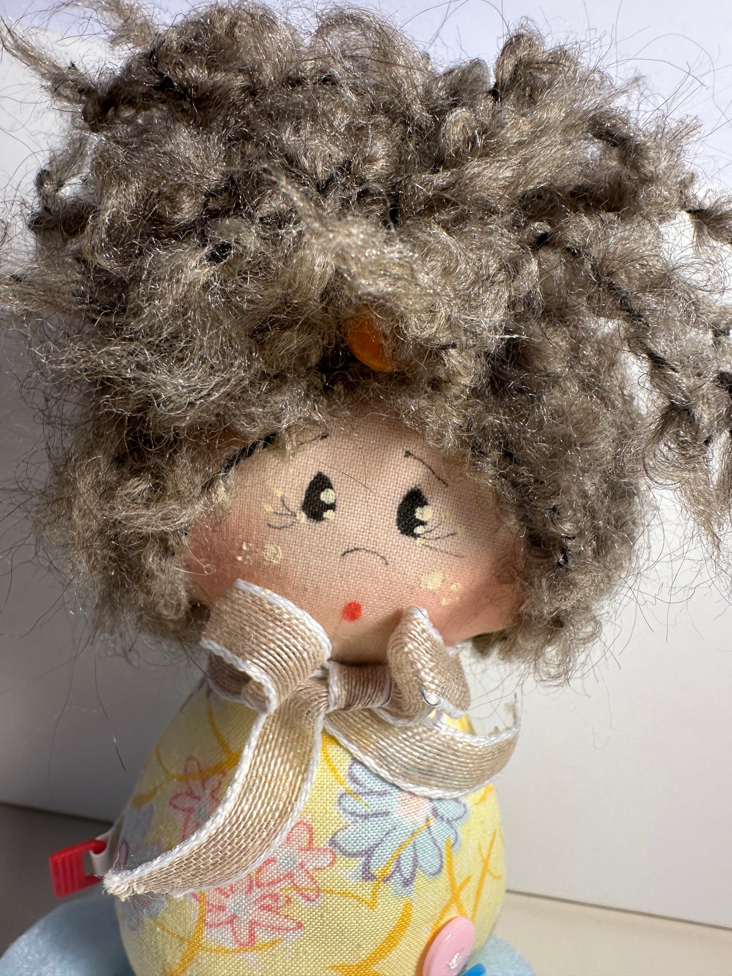 Doll with tape measure and pincushion