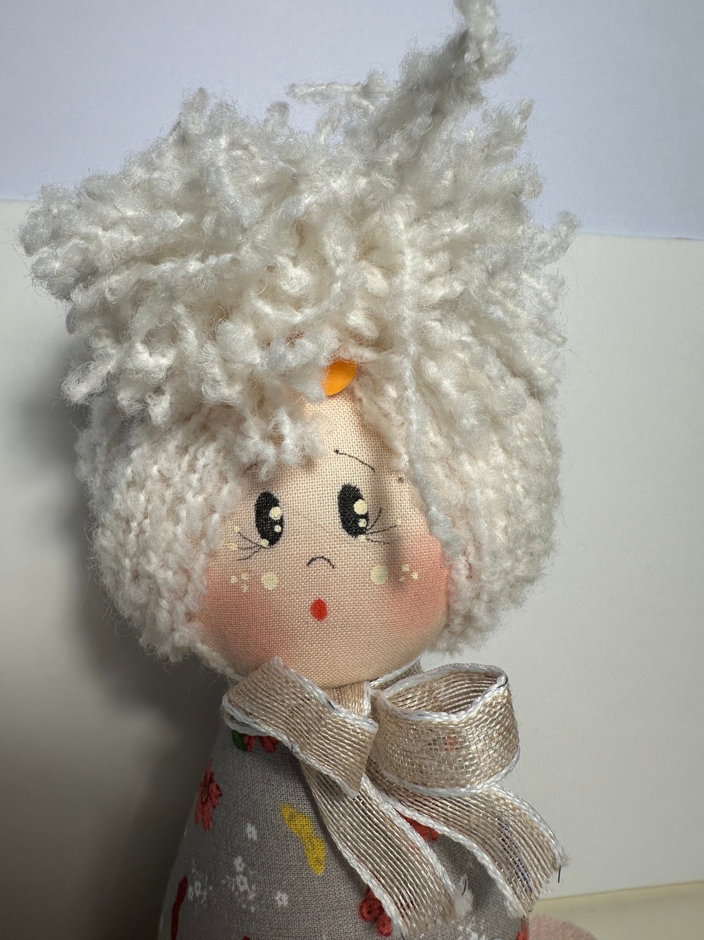 Doll with tape measure and pincushion